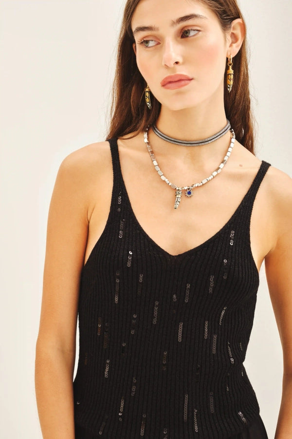 musculosa v night